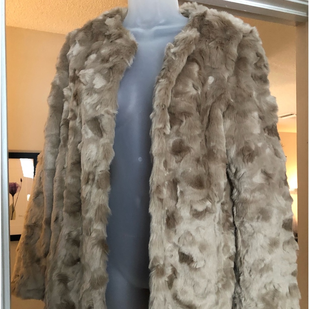 Beautiful Express Brand size medium tan faux fur coat